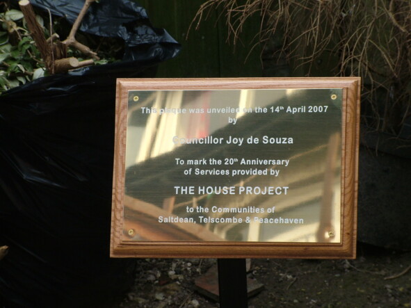 Image of Brass Plaque on Backing Board with white infilled engraving